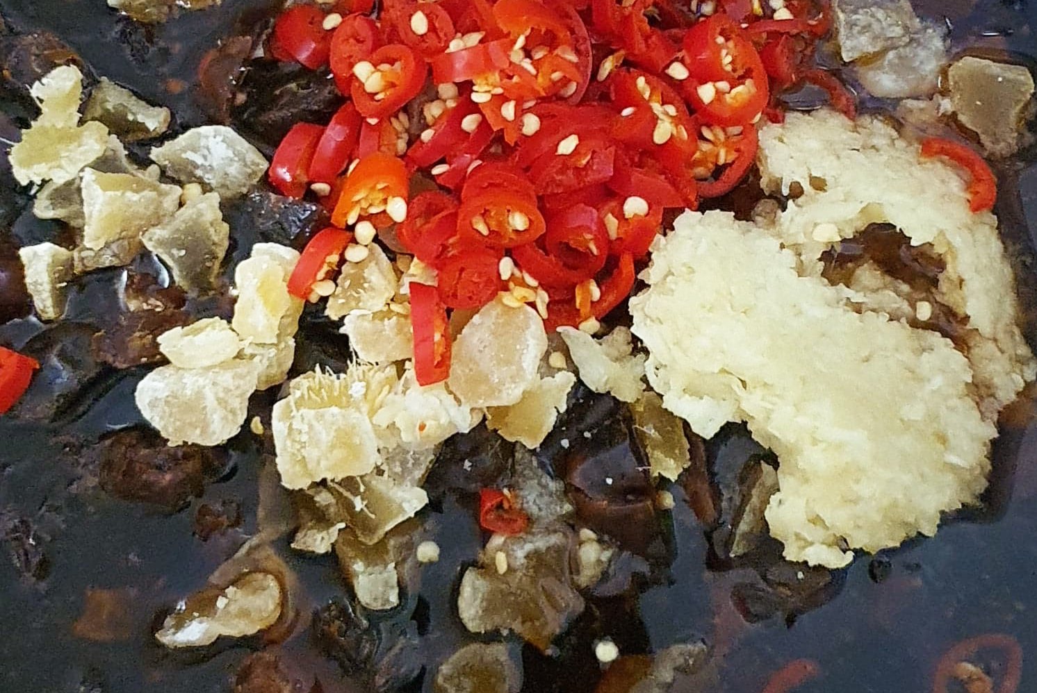 Image of adding chillies and mangos